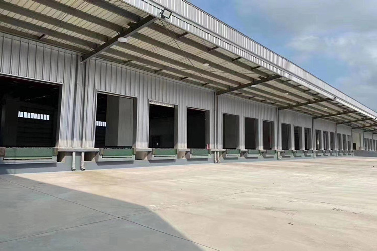 Hangar de almacén de estructura de acero para su distribución